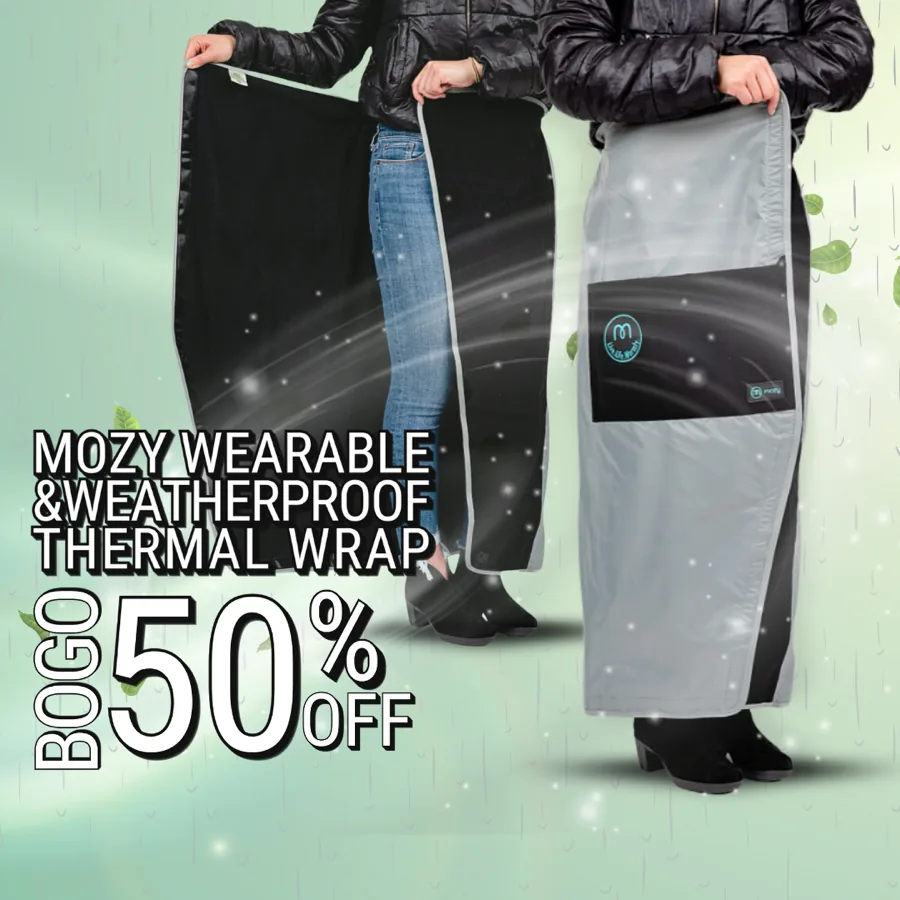 Mozy wearable thermal outdoor wrap in navy, worn over the legs at a sideline