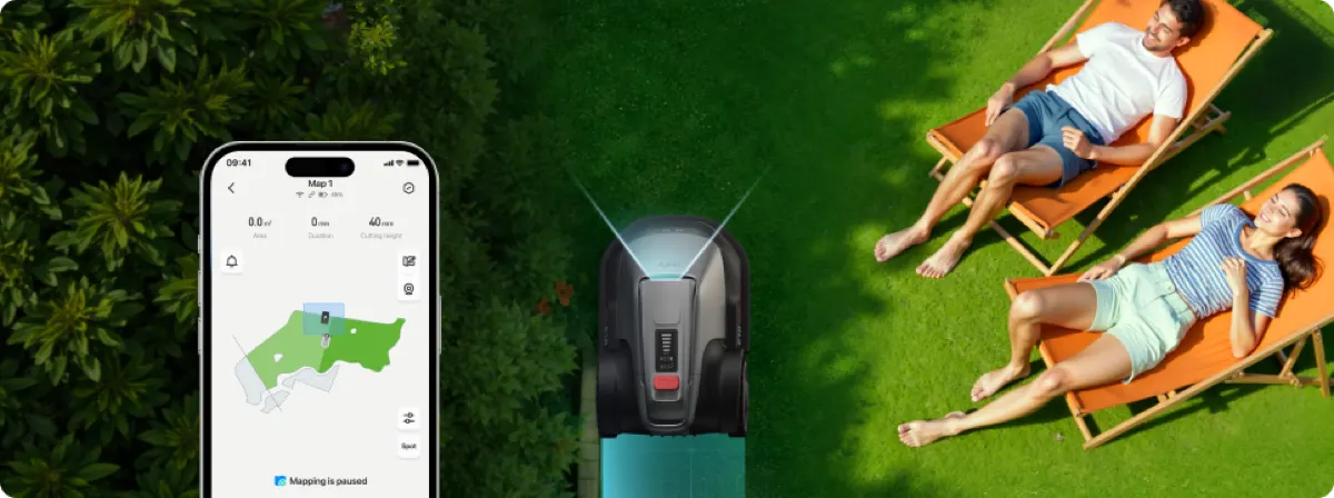 Eufy E18 mowing a residential lawn
